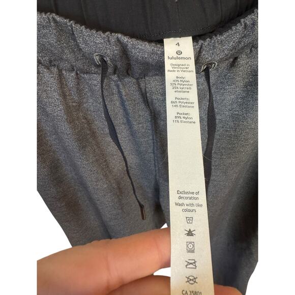 LULULEMON On The Fly Pant (28") Heathered Black Size 4 Pockets Athleisure Travel - Picture 3 of 9